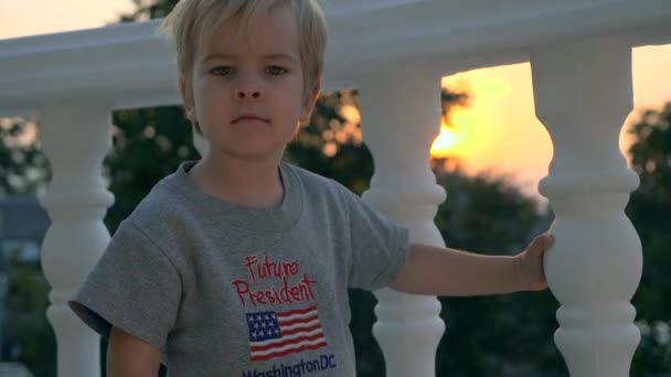 Little Boy Waving Hands. Child Dressed in T-shirt with Sign Future President and American Flag. Slow motion 60 fps - Metraje, vídeo