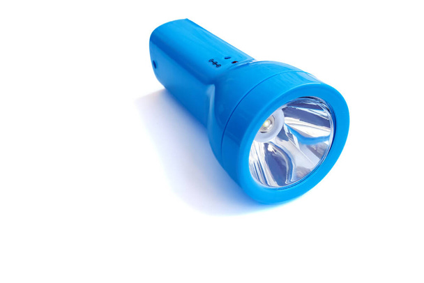 Taschenlampe mit Akku, weißer Hintergrund mit Platz für Text - Foto, Bild