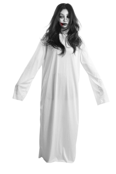 Scary ghost woman standing isolated over white background. Halloween concept - Valokuva, kuva