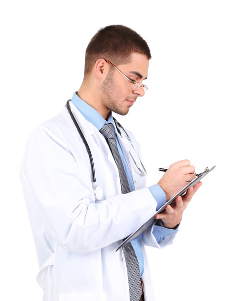 Man arts staat met map, geïsoleerd op witte achtergrond - Foto, afbeelding