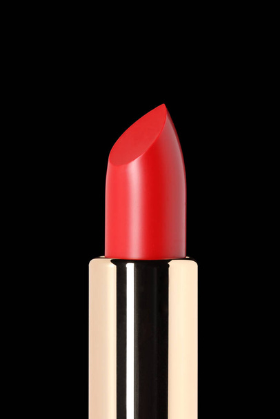 red lipstick isolated on black background with copy space for your text - Photo, Image