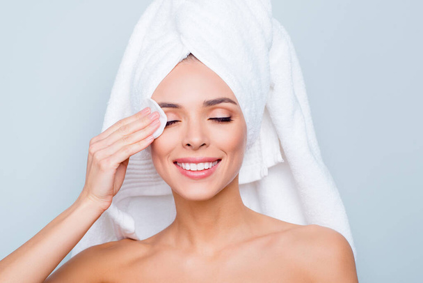 Close up photo portrait of attractive with perfect skin brunette in bathroom she her getting relaxation from taking cosmetics off skin towel on head hair eyes closed isolated on grey background - Foto, Bild