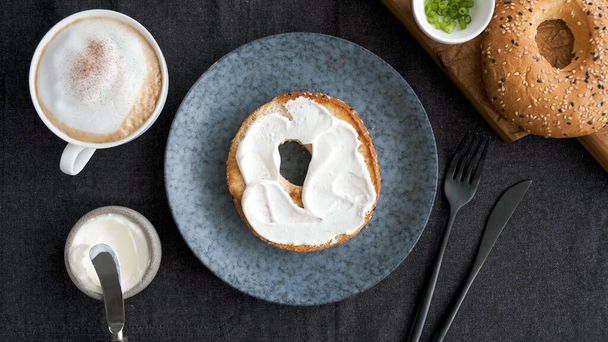 Toasted bagel with cream cheese - Photo, image