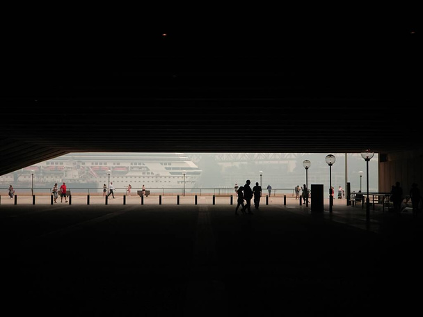 A partial view of Sydney riverside waterfront from an interior silhouette of building structure - Photo, Image