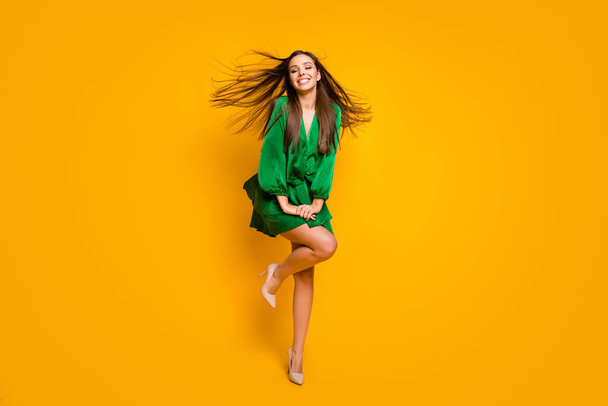 Full length body size view of her she nice attractive pretty feminine cheerful cheery straight-haired girl having fun posing isolated over bright vivid shine vibrant yellow color background - Фото, зображення