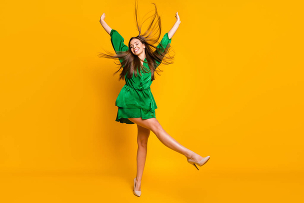 Full length body size view of nice attractive pretty cheerful cheery dreamy straight-haired girl having fun celebrating rising hands up isolated over bright vivid shine vibrant yellow color background - Φωτογραφία, εικόνα