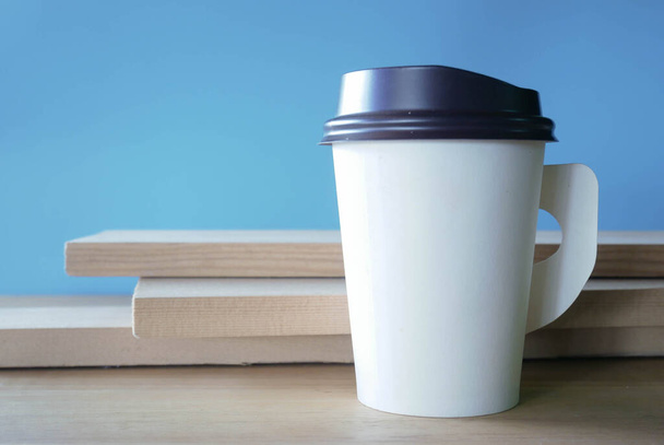 Paper coffee cup in coffee shop. - Photo, Image