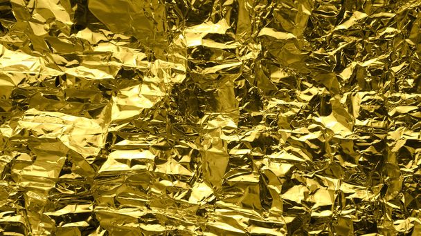 Sfondo foglio d'oro con superficie lucida stropicciata per sfondo texture - Foto, immagini