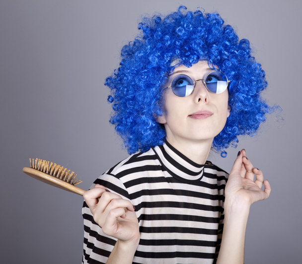 Coquette blue-hair girl with comb. - Photo, Image