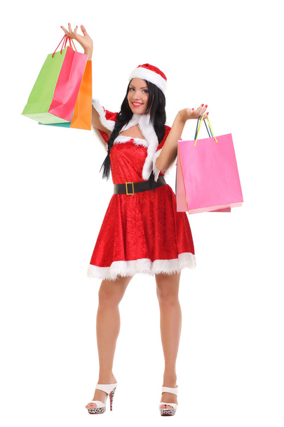 Kerstmis, geschenk. Gelukkige vrouw met shopping tassen. - Foto, afbeelding