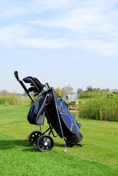 Golf scene with bag and golf club - Photo, image