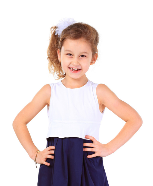 Young girl poses for a picture. Isolated on white background - Photo, Image