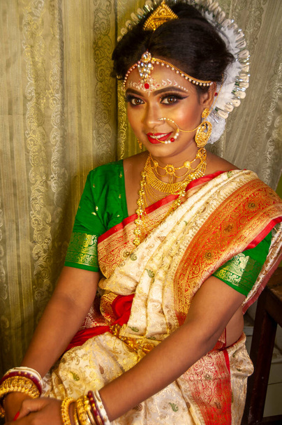 an indian woman with bridal makeup - Фото, изображение
