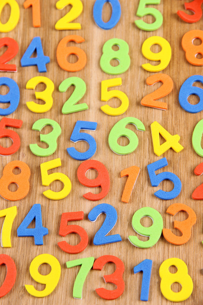 Colorful numbers on wooden background - Fotografie, Obrázek