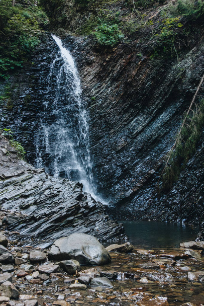 Mountain waterfall Huk in The Carpathians, Ukraine - 写真・画像