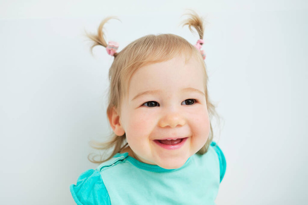 Portrait of happy smiling toddler girl at home. - Фото, изображение