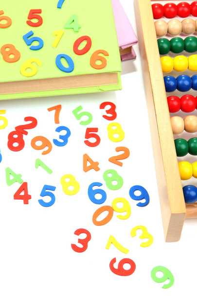 Colorful numbers, abacus, books and markers, isolated on white - Фото, изображение