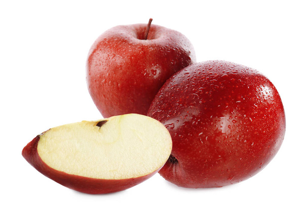 Cut and whole red apples on white background - Fotó, kép