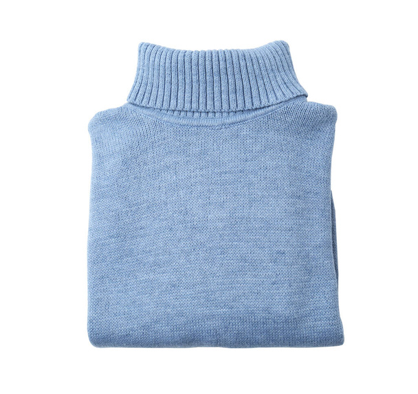 Folded blue turtleneck sweater isolated on white, top view - Fotoğraf, Görsel