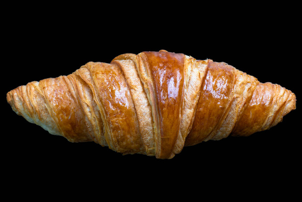 Croissant izolované na černém pozadí s výstřižkem cesta. - Fotografie, Obrázek