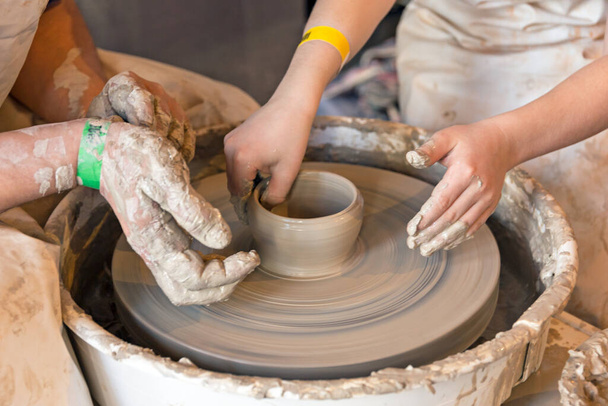 Pottery work, making vase from clay, detail. - Photo, Image