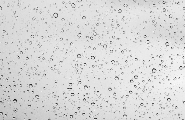 Gotas de agua sobre vidrio, gota de lluvia - Foto, imagen