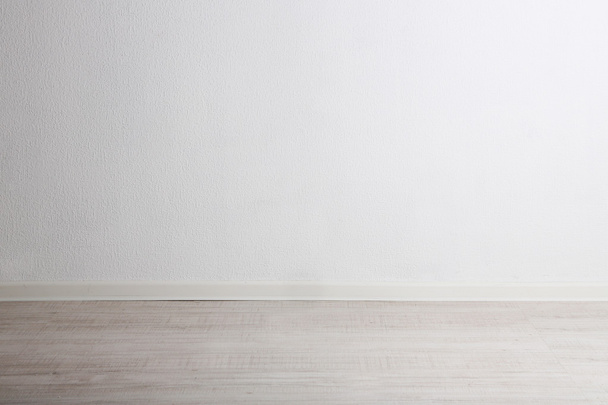 Empty room with wall and wooden floor - Foto, imagen