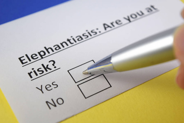 One person is answering question about elephantiasis. - Photo, Image