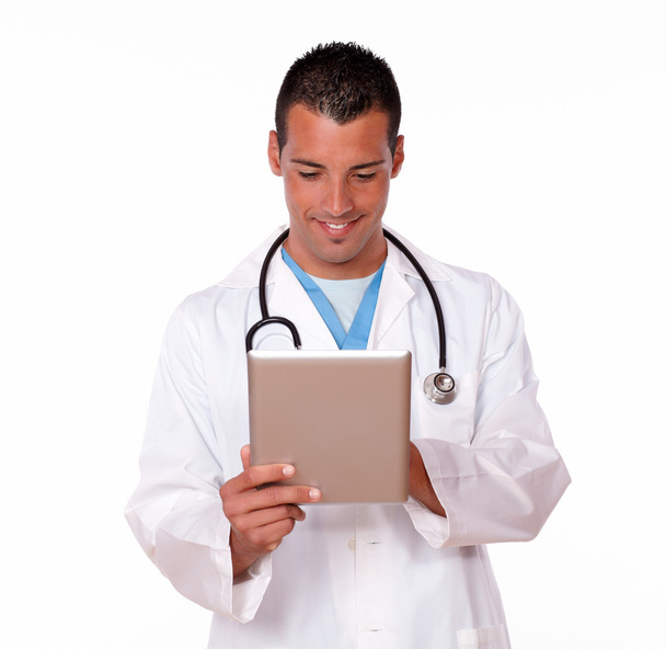 Charming male doctor working with his tablet pc - Fotografie, Obrázek