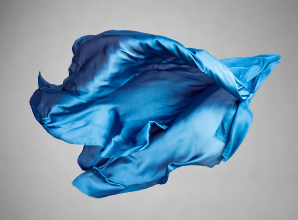 abstract blue fabric in motion - Φωτογραφία, εικόνα