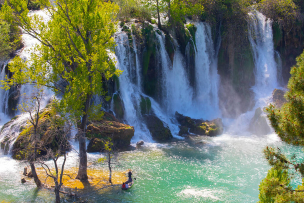 Водопад Кравиц на реке Трабизат в Боснии и Герцеговине - Фото, изображение