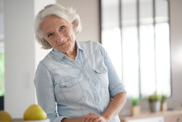 Portrait of smiling senior woman with white hair - Fotografie, Obrázek