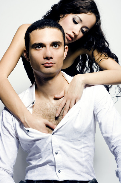 Young attractive couple. Handsome man and sexy woman - Фото, зображення