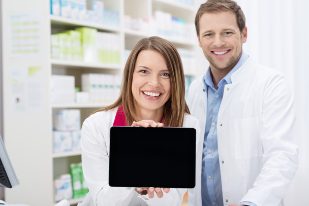 Happy female pharmacist doing a promotion - Fotografie, Obrázek
