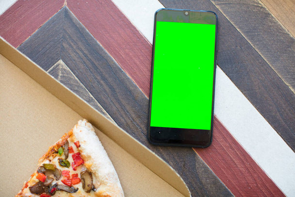 empty green screen smart mobile telephone . chroma key concept - Foto, Imagen