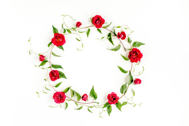 Wreath frame made of green branches, leaves and roses isolated on white background. lay flat, top view - Foto, Imagem
