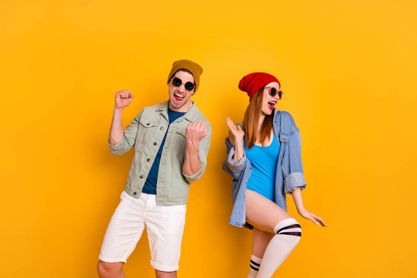 Portrait of his he her she nice attractive glad carefree cheerful cheery funny couple spending weekend dancing having fun leisure isolated on bright vivid shine vibrant yellow color background - Valokuva, kuva