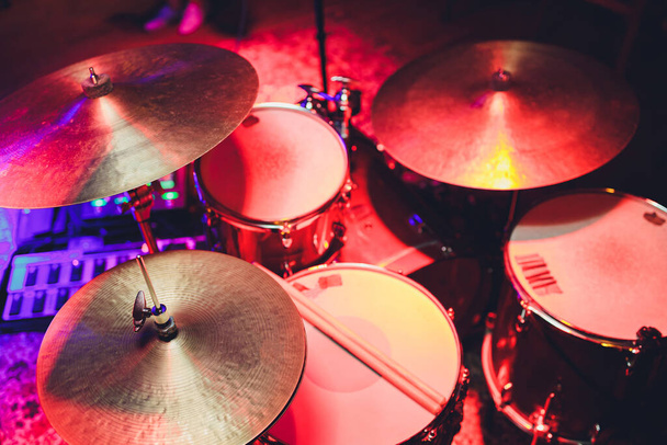 Drum Set with some cymbals on stage before a live Concert. - Foto, imagen