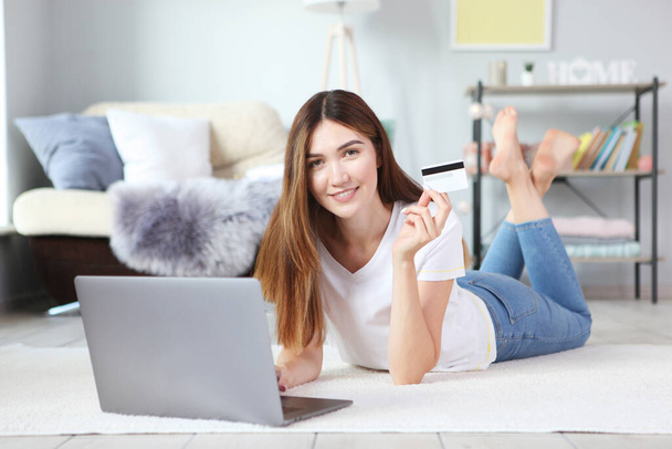girl shopping online using a modern computer - Фото, изображение