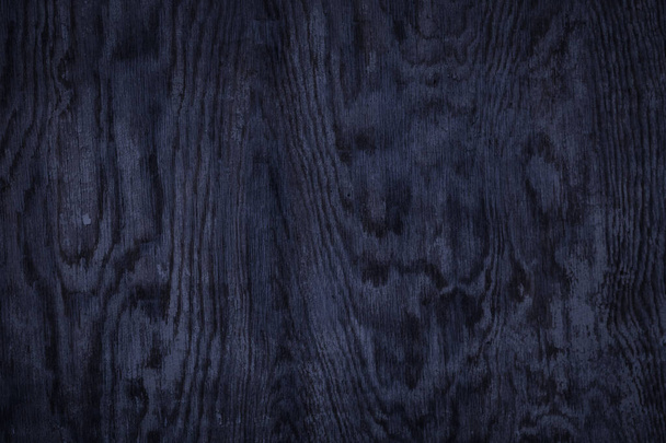 Černá tmavě modrá dřevěná omšelá textura stolu. Abstraktní pozadí, prázdná šablona, textový prostor. - Fotografie, Obrázek