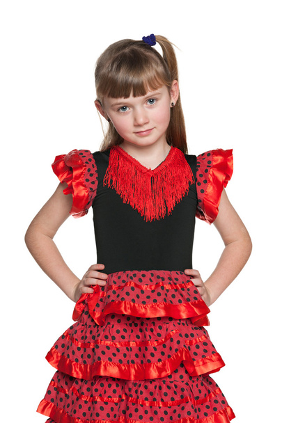 hübsches junges Mädchen in einem roten Tupfen-Kleid - Foto, Bild
