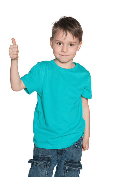 Fashion preschool boy holds his thumb up - Fotó, kép