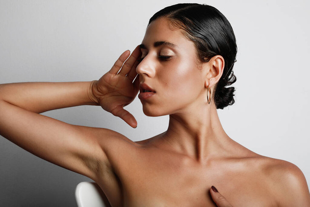 Beauty Spa caucasian young woman portrait. Beautiful woman touching her face. Skin care concept. - Foto, Imagem