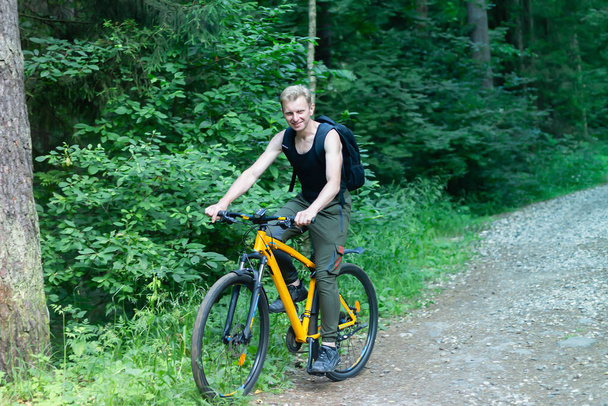 the man on a bike in the woods - Photo, Image