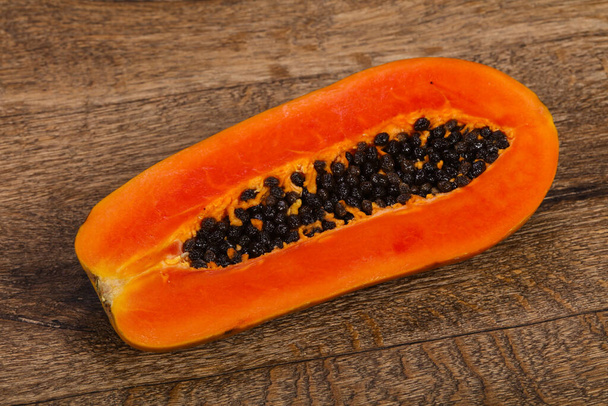 Gustosi deliziosi frutti maturi affettati Papaya
 - Foto, immagini