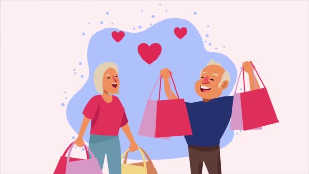 ηλικιωμένοι ζευγάρι με τσάντες αγορών και καρδιές χαρακτήρες - Πλάνα, βίντεο