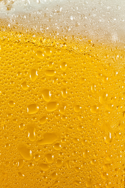 Burbujas y espuma en una cerveza
 - Foto, Imagen