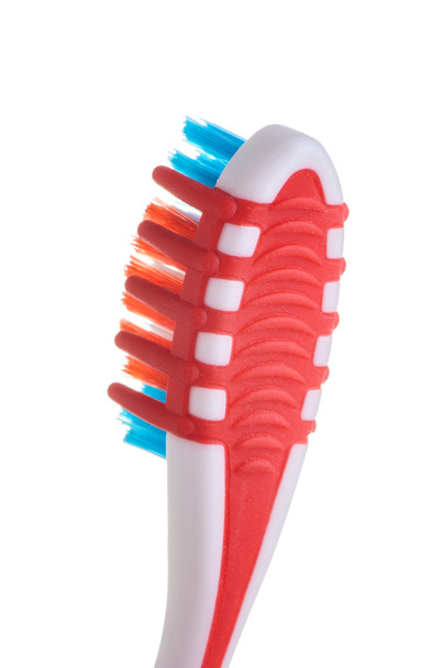 Cepillo de dientes con limpiador de lengua
 - Foto, imagen