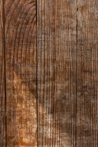 Alte Holzstruktur, vertikal. Grunge-Holzbretter. Verwitterte Hartholztapete. Vintage schmutzige Planken. Holzoberfläche. Braunes Holz. - Foto, Bild