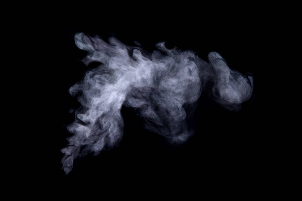 Abstract  powder or smoke isolated on black background - Φωτογραφία, εικόνα